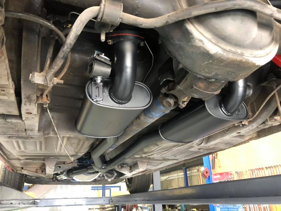 Regular mufflers fitted on a vehicle